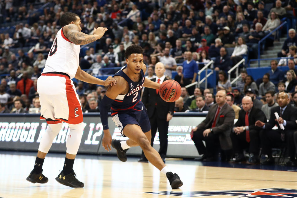 HARTFORD, CT - MARCH 11: Jalen Adams #2 of the Connecticut Huskies dribbles against the Cincinnati Bearcats during the semifinal round of the AAC Basketball Tournament at the XL Center on March 11, 2017 in Hartford, Connecticut. (Photo by Maddie Meyer/Getty Images)